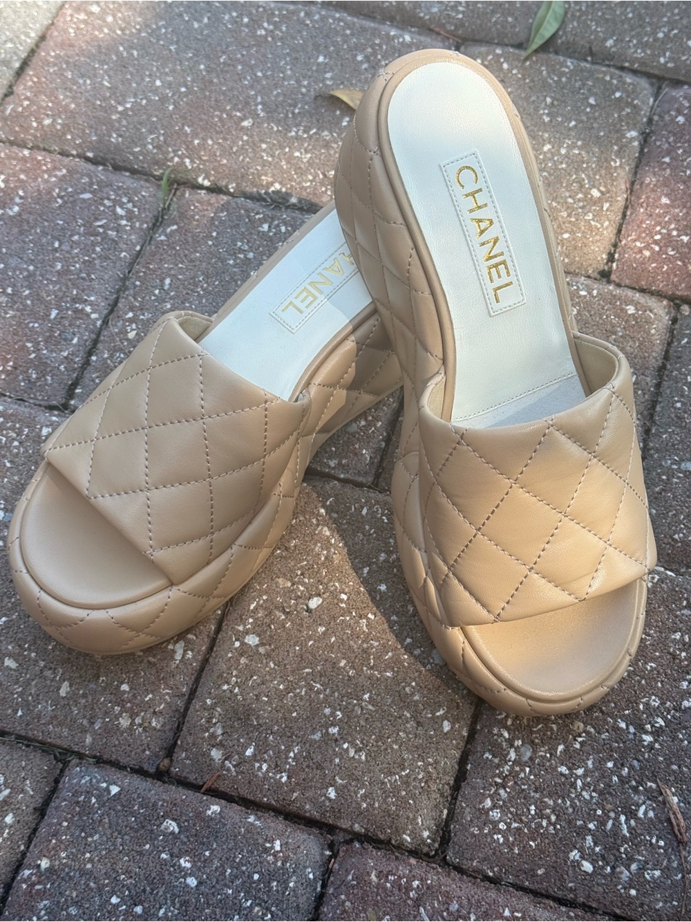 CHANEL Quilted Slide Mules in Neutral Beige